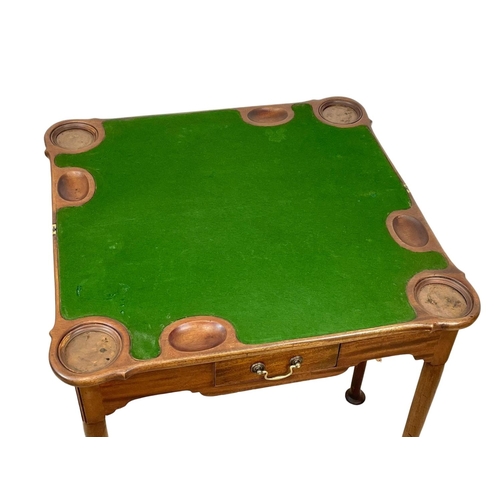 802 - A late 19th century George II style mahogany turnover games table. Circa 1880. 75 x 36.5 x 73.5cm