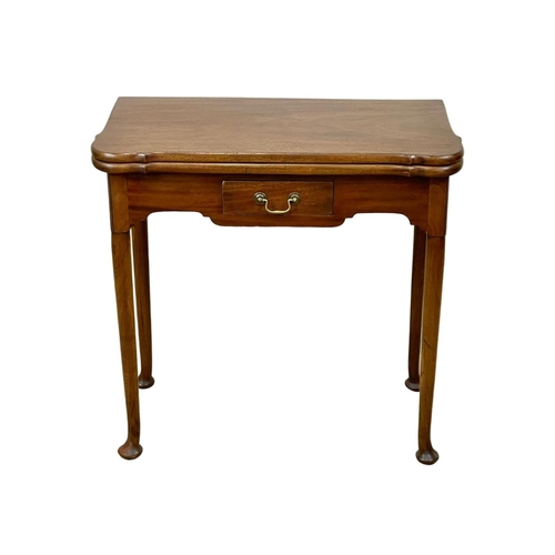 802 - A late 19th century George II style mahogany turnover games table. Circa 1880. 75 x 36.5 x 73.5cm