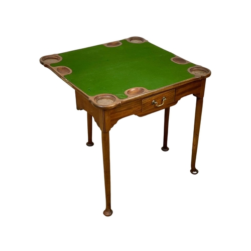 802 - A late 19th century George II style mahogany turnover games table. Circa 1880. 75 x 36.5 x 73.5cm