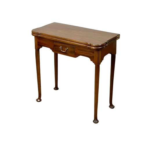 802 - A late 19th century George II style mahogany turnover games table. Circa 1880. 75 x 36.5 x 73.5cm