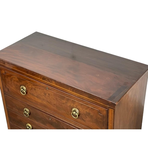 805 - A George IV inlaid mahogany secretaire chest of drawers, with brass drop ring handles and on bracket... 