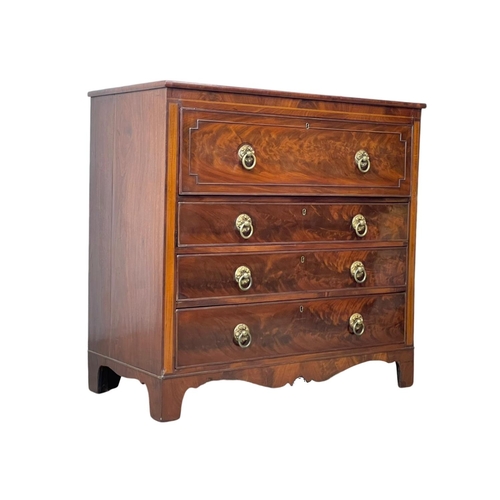 805 - A George IV inlaid mahogany secretaire chest of drawers, with brass drop ring handles and on bracket... 