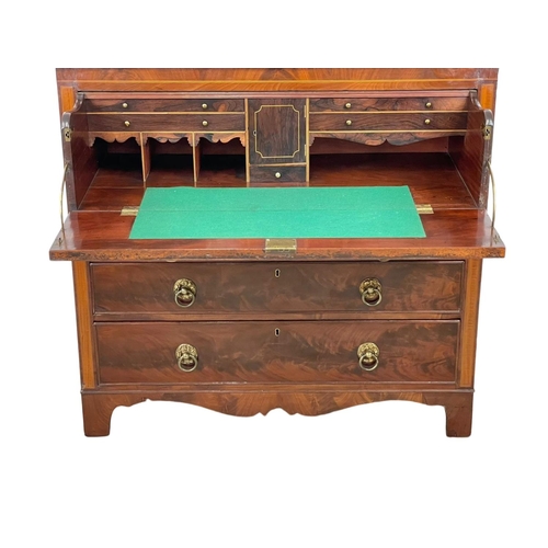 805 - A George IV inlaid mahogany secretaire chest of drawers, with brass drop ring handles and on bracket... 