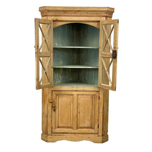 806 - A late Georgian pine corner cabinet. 101 x 54 x 184cm