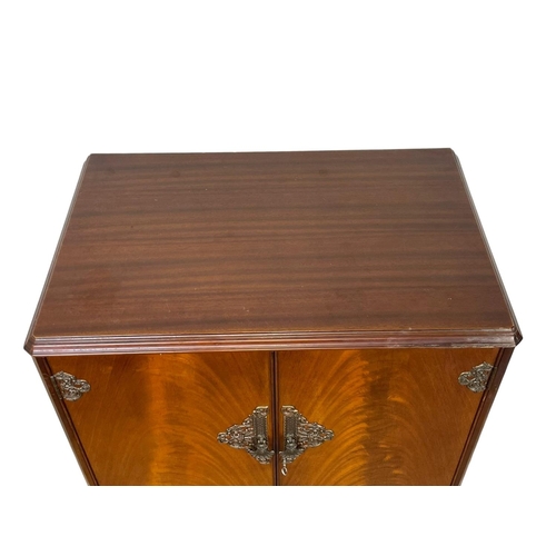 807 - A vintage Georgian style walnut cocktail cabinet. 74 x 49 x 147cm