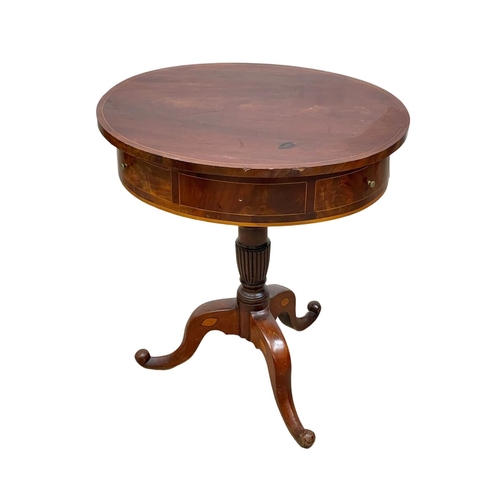 814 - A George IV inlaid mahogany metamorphic pedestal table. Closed 61 x 45 x 67.5cm. Open 90.5cm