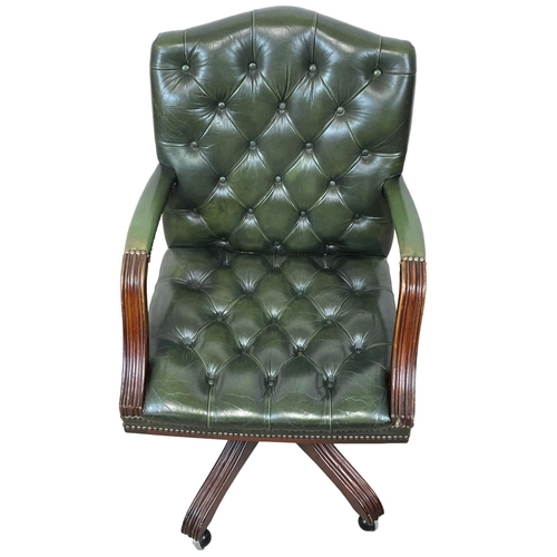 815 - A Gainsborough style deep button leather swivel desk chair.