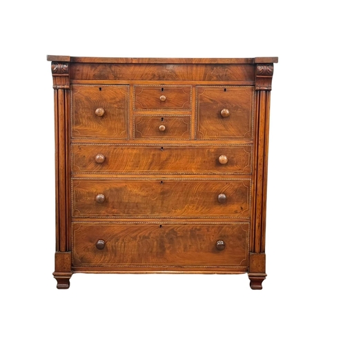 816 - A large Victorian inlaid mahogany chest of drawers. 126 x 57.5 x 134cm