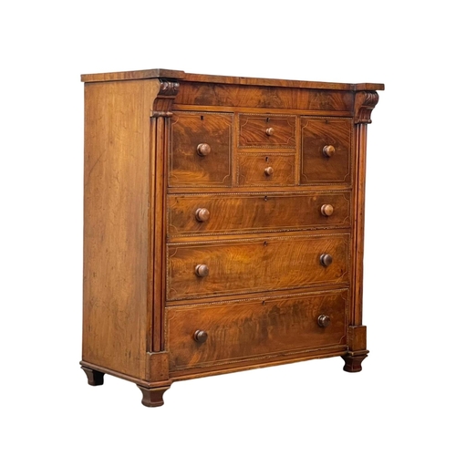 816 - A large Victorian inlaid mahogany chest of drawers. 126 x 57.5 x 134cm