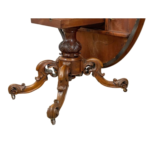 818 - A Victorian Burr Walnut tilt top breakfast / dining table, with carved base. Circa 1860-1870. 147 x ... 