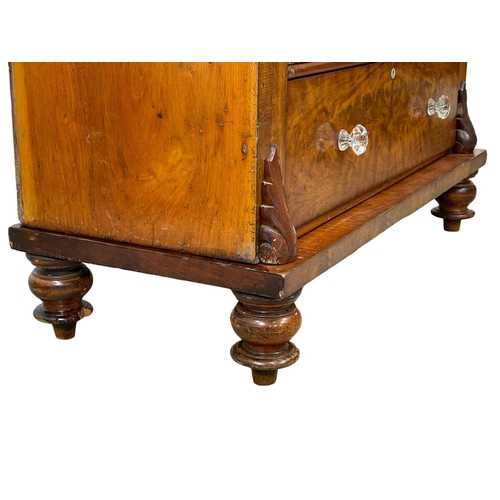 819 - A large Victorian flamed mahogany chest of drawers, with original glass handles. Circa 1860-1870. 12... 