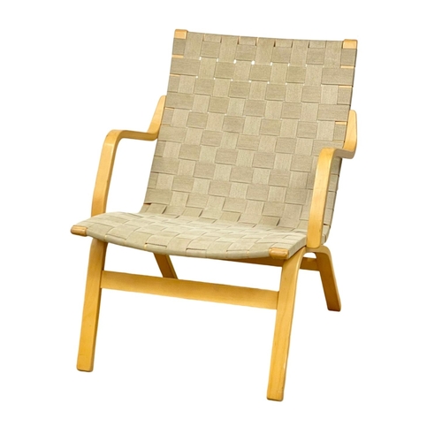 823 - A 1970’s Mid Century lounge chair, in the manner of Bruno Mathsson.