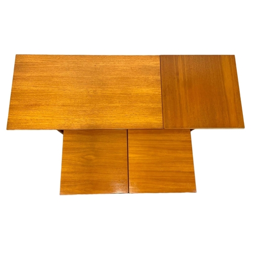 824 - A McIntosh “Triform” drop leaf sliding top coffee table, with 2 nesting tables. Mid Century.