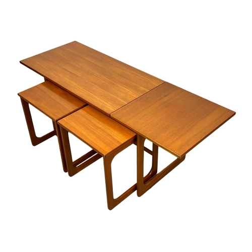 824 - A McIntosh “Triform” drop leaf sliding top coffee table, with 2 nesting tables. Mid Century.