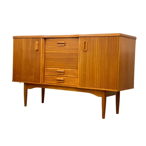 826 - A Mid Century teak sideboard. 145.5 x 46 x 89cm