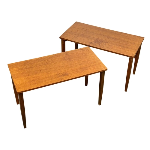 829 - A pair of Mid Century teak and afromosia end tables. 60.5 x 30.5 x 35.5cm