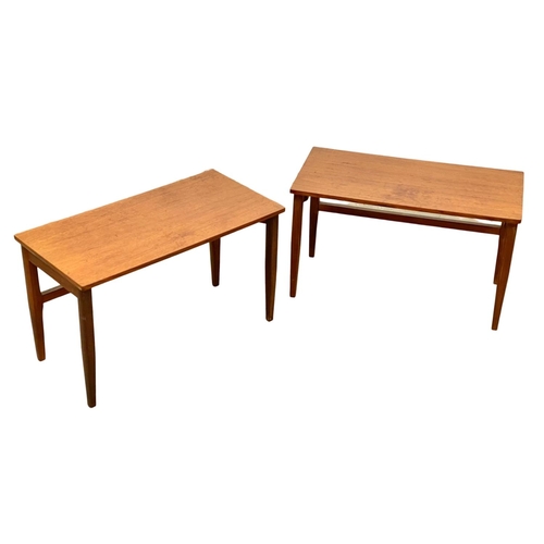 829 - A pair of Mid Century teak and afromosia end tables. 60.5 x 30.5 x 35.5cm