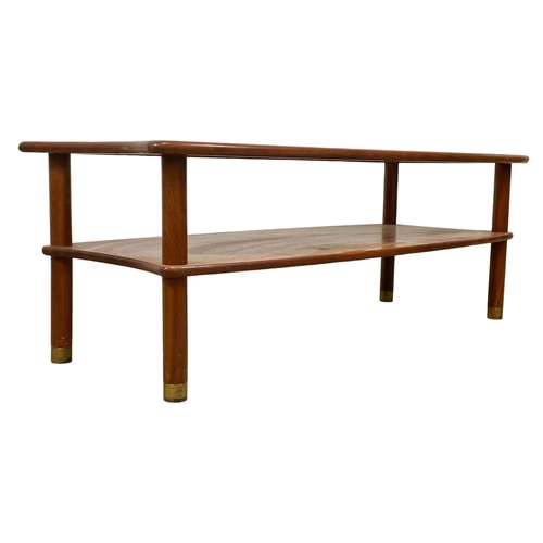 832 - A G-Plan Mid Century teak 2 tier coffee table, with smoked glass top. E.Gomme. 1960’s. 123 x 56 x 43... 