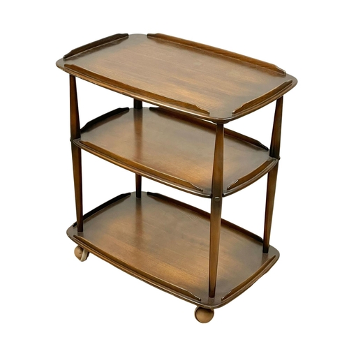 833 - An Ercol Mid Century elm 3 tier serving trolley. 71.5 x 46.5 x 77cm