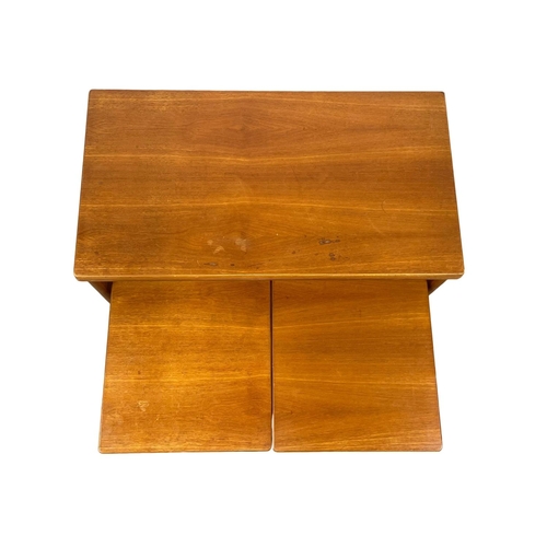 835 - A McIntosh “Triform” Mid Century teak turnover coffee table, with 2 nesting tables.