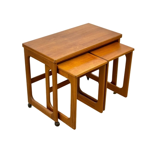 835 - A McIntosh “Triform” Mid Century teak turnover coffee table, with 2 nesting tables.