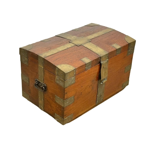 838 - A Victorian brass bound teak trunk. 66 x 40 x 40cm