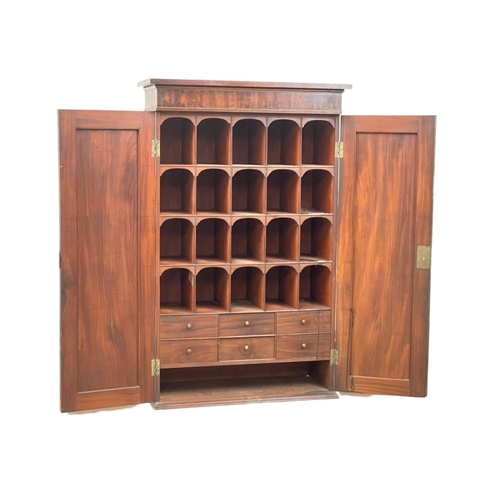 844 - A George III mahogany wall hanging 2 door pigeonhole cupboard, with interior shelves. Circa 1800. 66... 