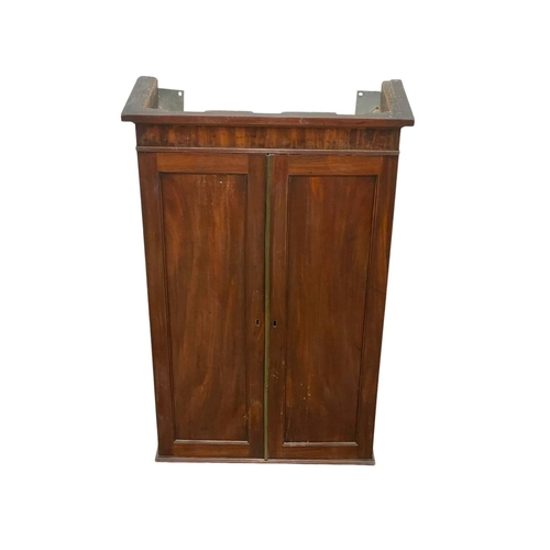 844 - A George III mahogany wall hanging 2 door pigeonhole cupboard, with interior shelves. Circa 1800. 66... 