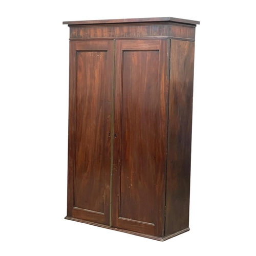 844 - A George III mahogany wall hanging 2 door pigeonhole cupboard, with interior shelves. Circa 1800. 66... 