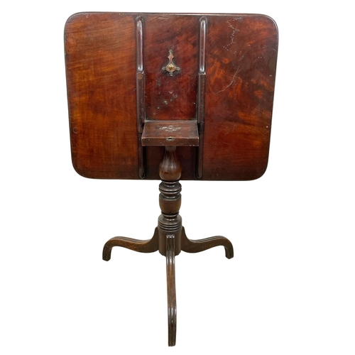 848 - A George III mahogany tilt top pedestal table. Circa 1780. 79 x 64 x 74cm