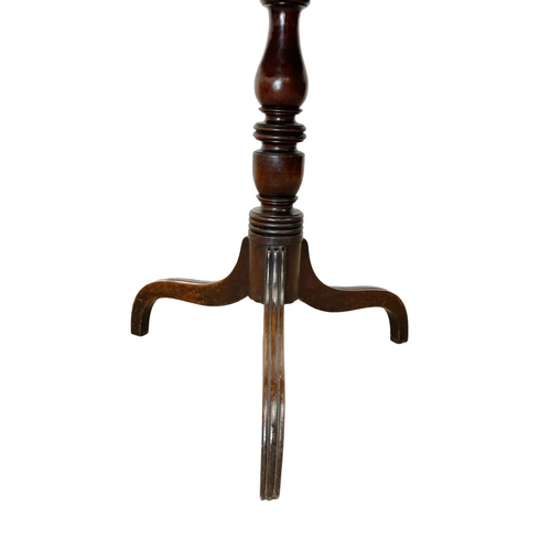 848 - A George III mahogany tilt top pedestal table. Circa 1780. 79 x 64 x 74cm