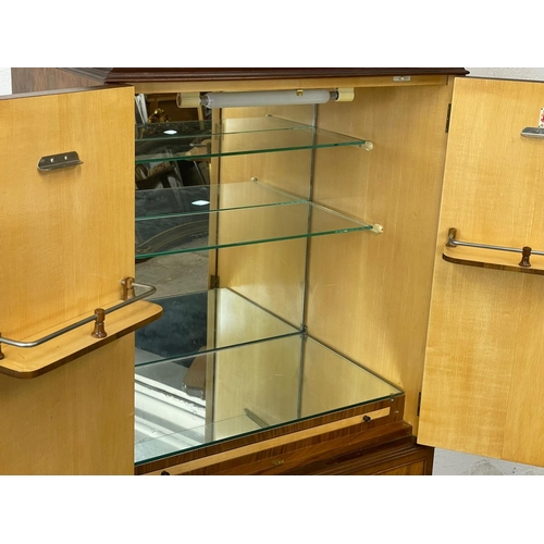 852 - A vintage Georgian style Burr Walnut cocktail cabinet, with 2 shelves. 77 x 49 x 153cm