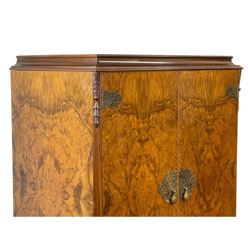 852 - A vintage Georgian style Burr Walnut cocktail cabinet, with 2 shelves. 77 x 49 x 153cm