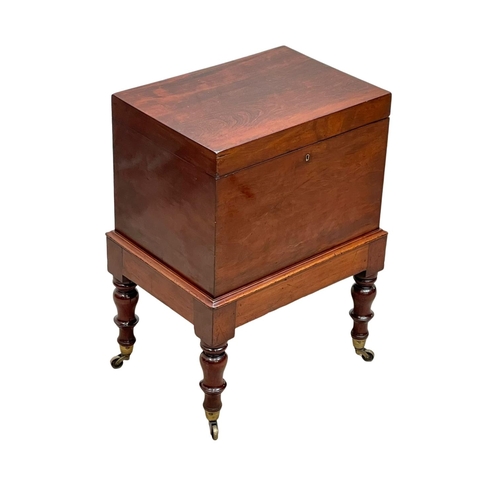 858 - A George IV mahogany Cellarette. Circa 1820. 44 x 33 x 59cm