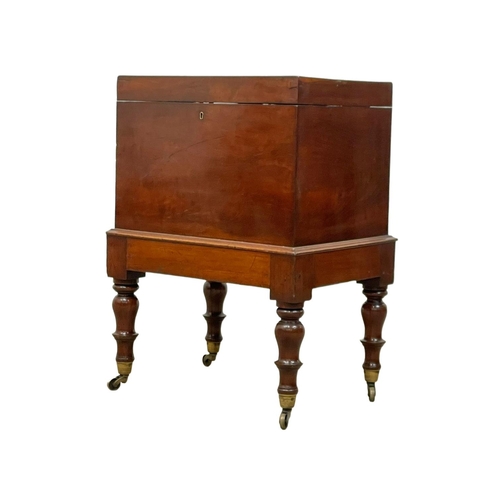 858 - A George IV mahogany Cellarette. Circa 1820. 44 x 33 x 59cm