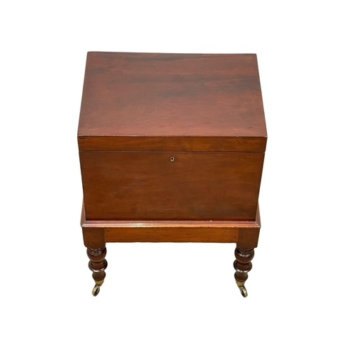 858 - A George IV mahogany Cellarette. Circa 1820. 44 x 33 x 59cm