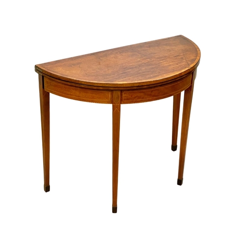 862 - A George III inlaid mahogany turnover tea table. Circa 1780. 91 x 45 x 73cm