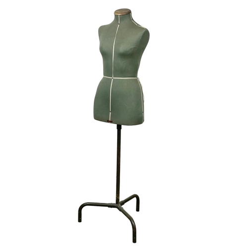 863 - A vintage Singer mannequin. 148cm