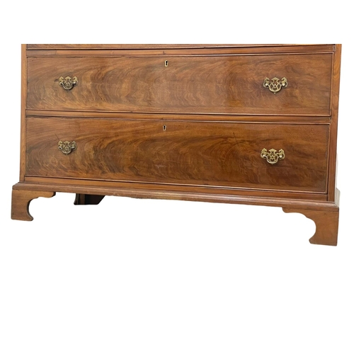 872 - A large Victorian mahogany chest of drawers raised on bracket feet in the Georgian style. Circa 1860... 