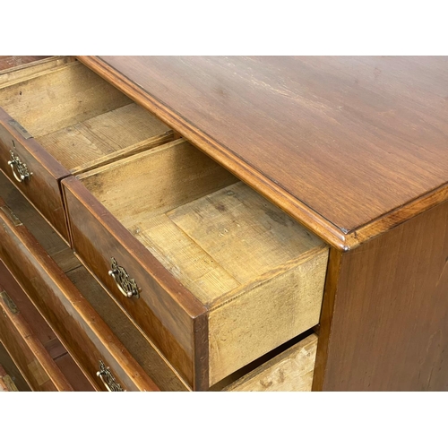 872 - A large Victorian mahogany chest of drawers raised on bracket feet in the Georgian style. Circa 1860... 