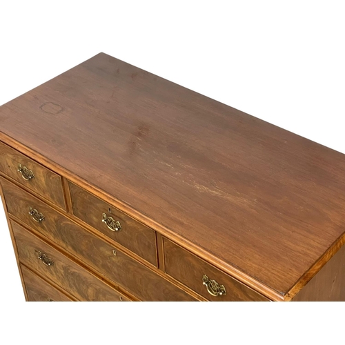 872 - A large Victorian mahogany chest of drawers raised on bracket feet in the Georgian style. Circa 1860... 