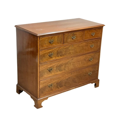 872 - A large Victorian mahogany chest of drawers raised on bracket feet in the Georgian style. Circa 1860... 