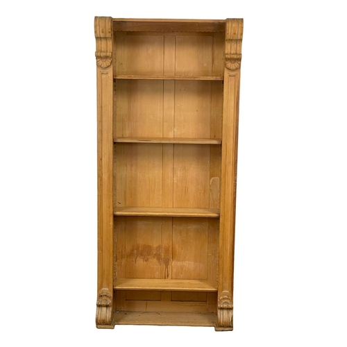 882 - A tall Victorian pine open bookcase with adjustable shelves. 89 x 26 x 196cm