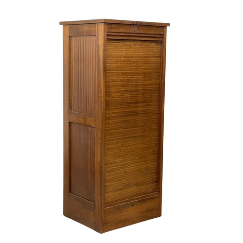 887 - An early 20th century tambour door filing cabinet by Astrola. 38.5 x 40.5 x 115cm