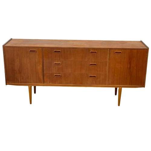 888 - A 1960’s Mid Century teak sideboard, with 3 drawers and 2 cupboards. 168 x 40 x 76cm