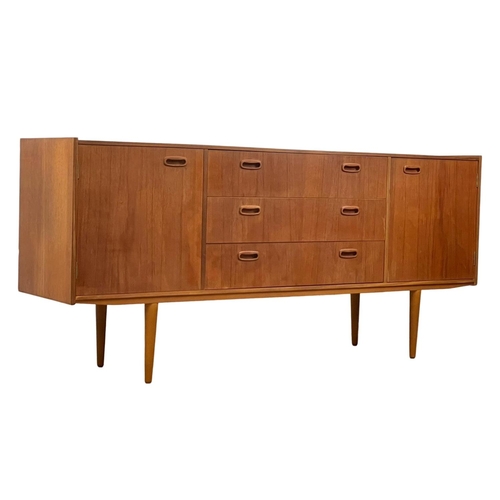 888 - A 1960’s Mid Century teak sideboard, with 3 drawers and 2 cupboards. 168 x 40 x 76cm