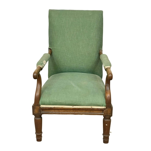 891 - A late George IV mahogany library armchair. Circa 1820-1830.