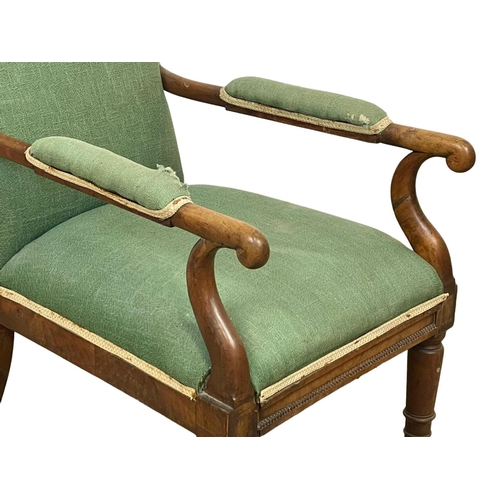 891 - A late George IV mahogany library armchair. Circa 1820-1830.