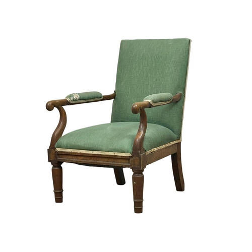 891 - A late George IV mahogany library armchair. Circa 1820-1830.