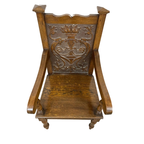 896 - A large late 19th century carved oak armchair. Circa 1890-1900.